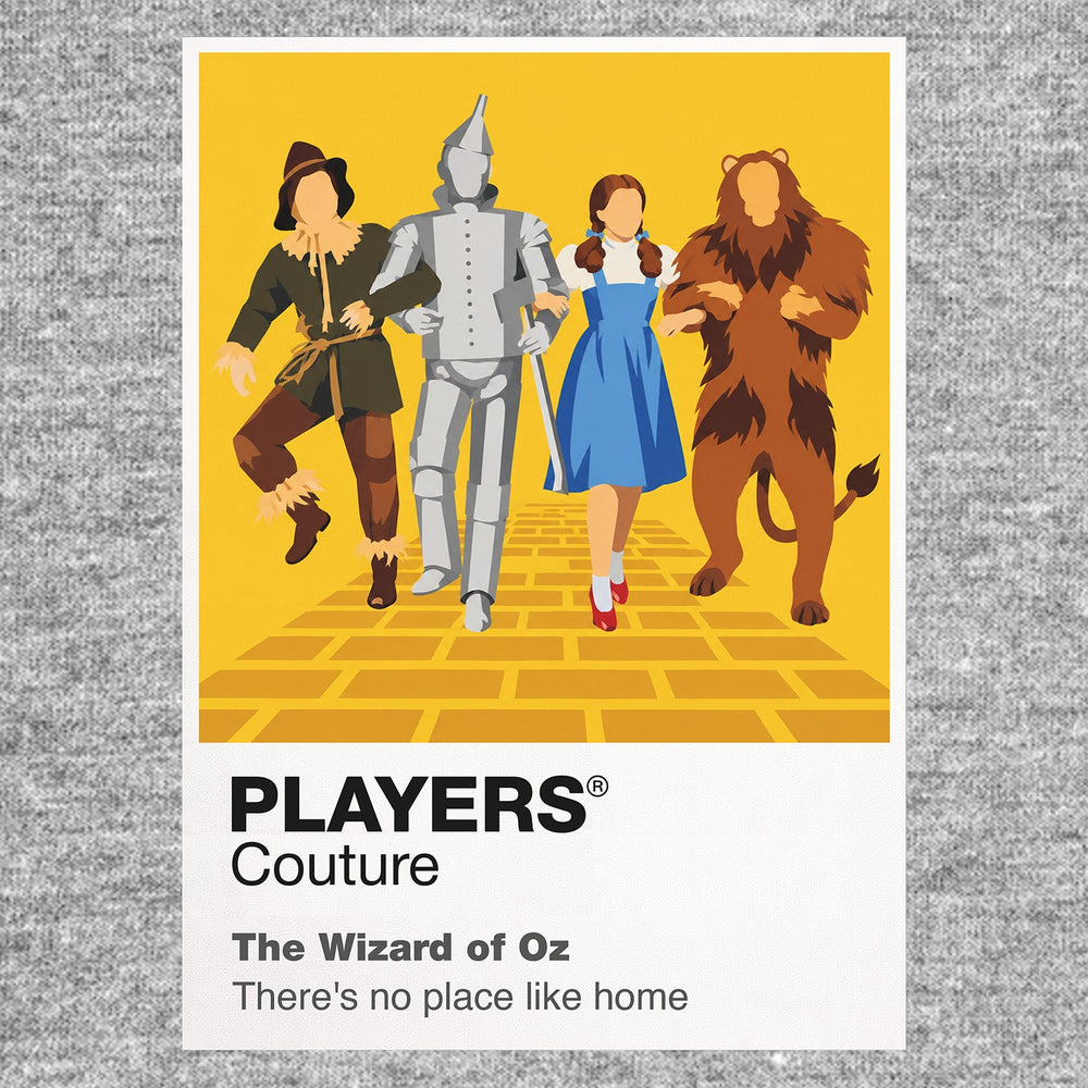 The Wizard of Oz Dorothy, Scarecrow, Tin Man and Cowardly Lion following the Yellow Brick Road towards Emerald City Icon Frame artwork in grey