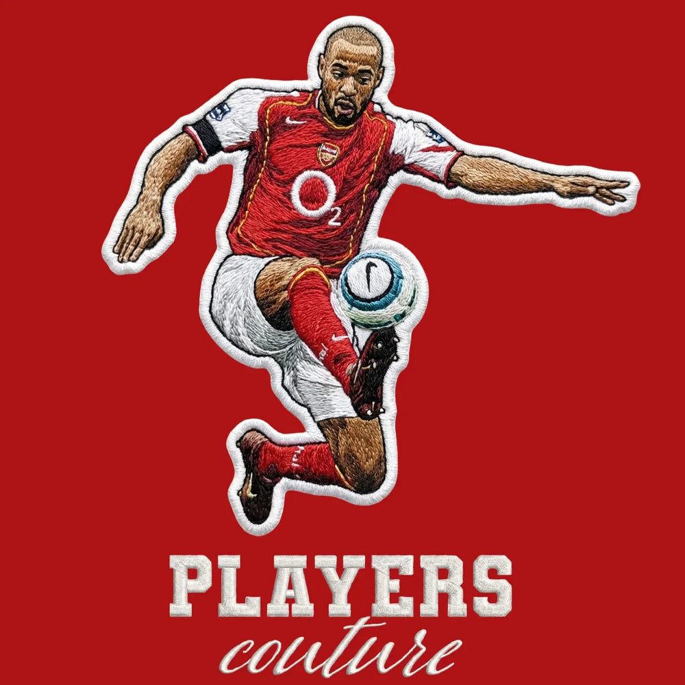 Thierry Henry Badge Men's Hoodie – red close-up detail shot of the Thierry Henry Players Couture logo design