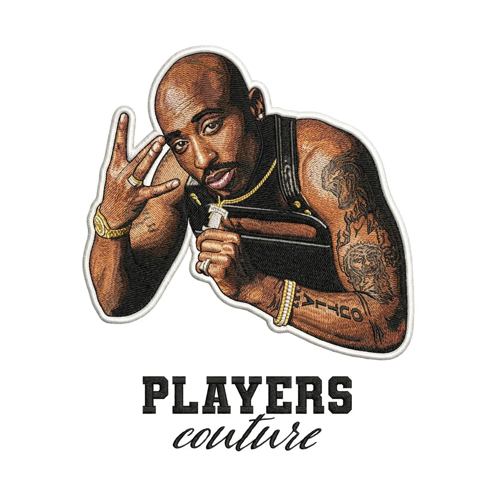 Tupac Shakur Badge Men's T-Shirt – black close-up detail shot of the Tupac Shakur Players Couture logo design
