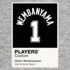 Victor Wembanyama 1 Jersey Frame Men's T-Shirt – grey close-up detail shot of the Victor Wembanyama 1 Players Couture logo